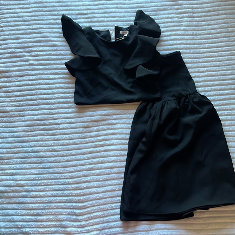 Black two piece long skirt and ruffled cropped top
